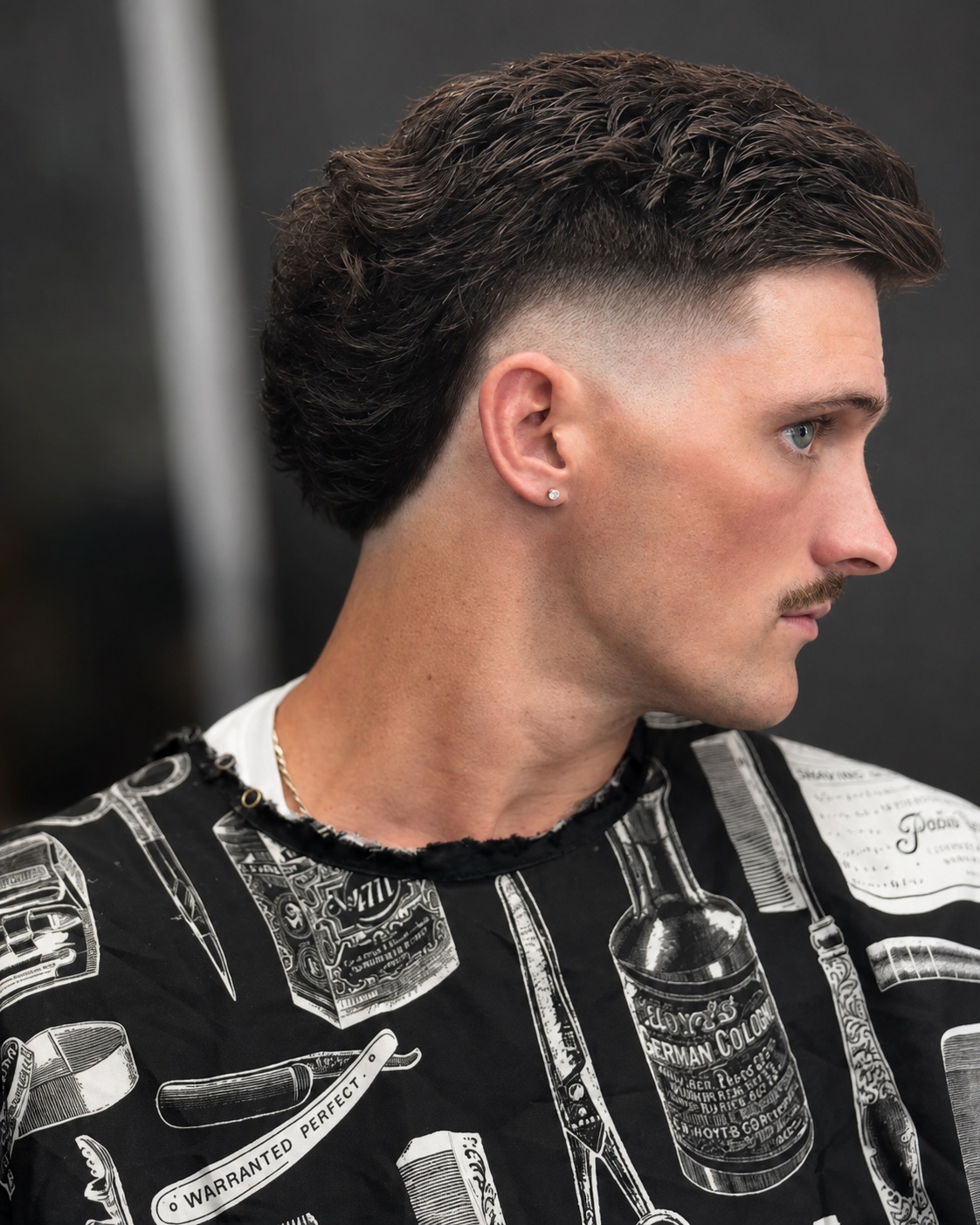Finished skin fade and textured haircut by Moe