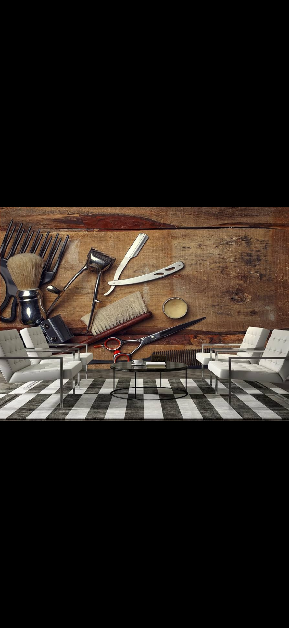 Barber chairs in front of a wall display of classic grooming tools